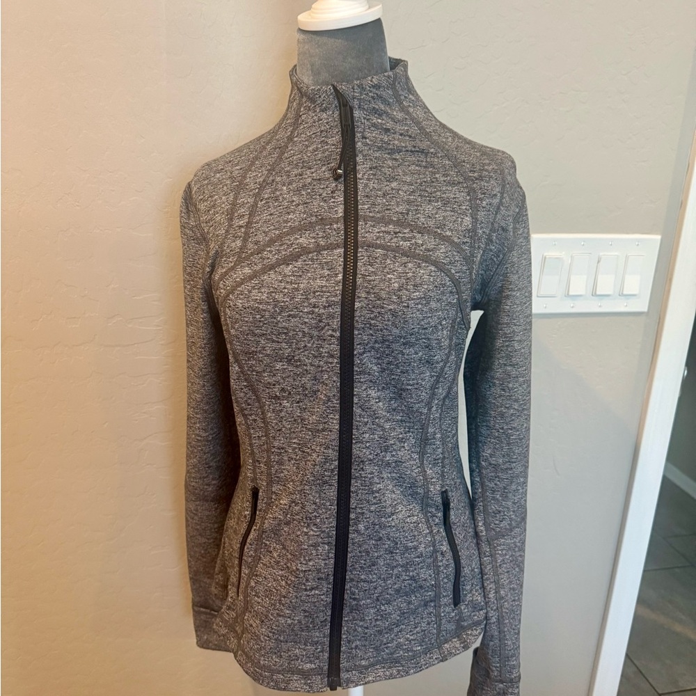 Lululemon workout jacket in Heathered Black and Gray. Size 10 EEUC